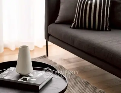 Stylish modern living room with elegant decor and cozy ambiance.
