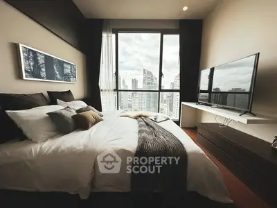 Luxurious bedroom with stunning city view and modern decor
