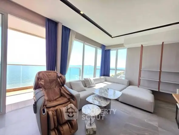 Luxurious living room with stunning ocean view and massage chair