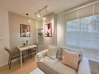 Modern living room with cozy dining area and stylish decor