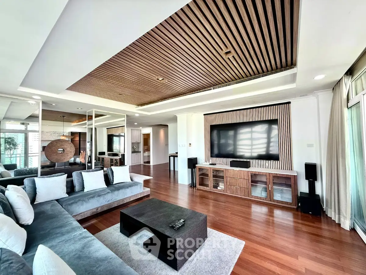 Luxurious modern living room with stylish wooden ceiling and sleek furniture
