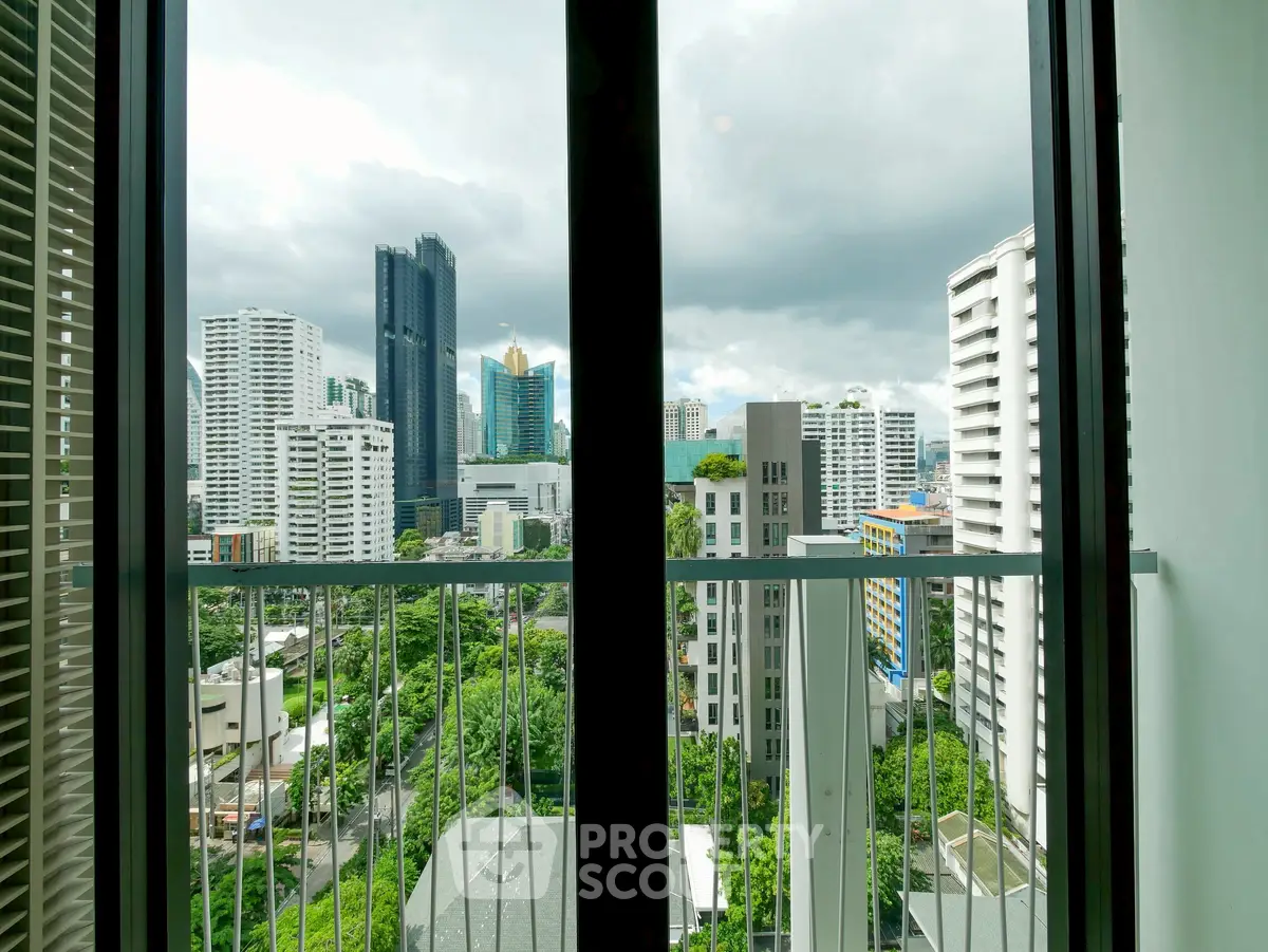 Stunning cityscape view from a modern apartment balcony, showcasing urban living at its finest.