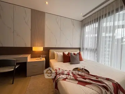Luxurious bedroom with modern decor, large window, and cozy ambiance in a high-end apartment.