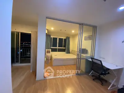 Modern apartment with spacious bedroom and balcony view