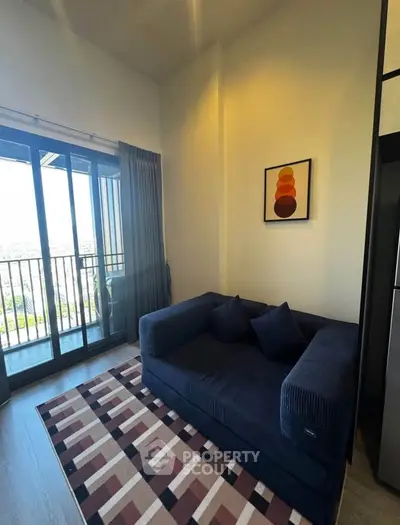 Stylish living room with modern sofa and balcony view