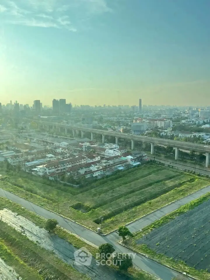 Stunning cityscape view with sprawling residential area and elevated highway.