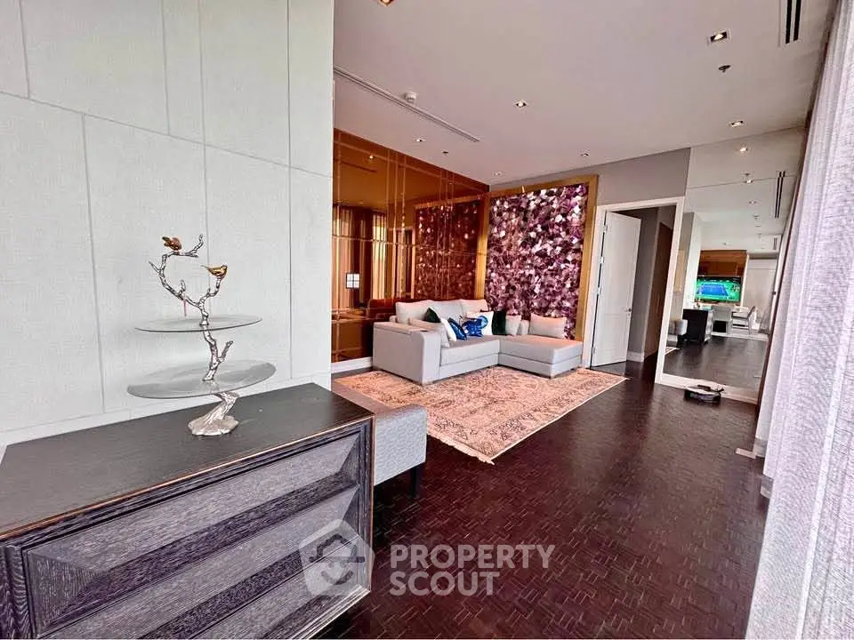 Luxurious living room with elegant decor and modern furniture in a high-end apartment.