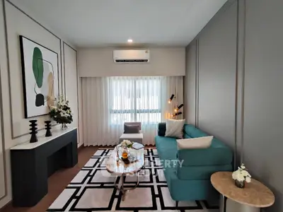 Stylish living room with modern decor and teal sofa, perfect for relaxation.