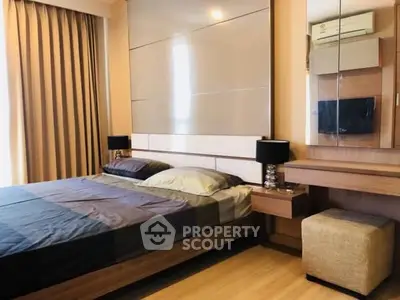 Modern bedroom with stylish decor and natural light