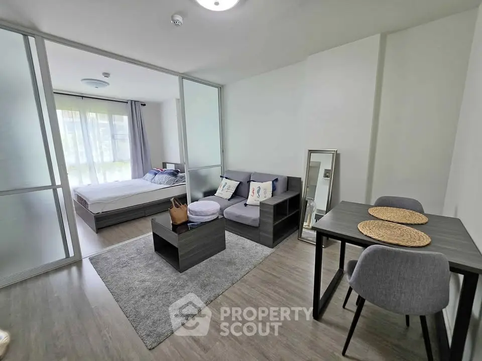 Modern studio apartment with open layout and stylish furnishings
