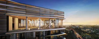 Stunning modern high-rise building with panoramic city views at sunset.
