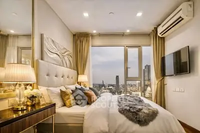 Luxurious bedroom with city view, elegant decor, and modern amenities in high-rise apartment.