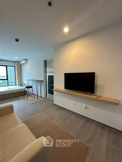 Modern studio apartment with sleek design and city view