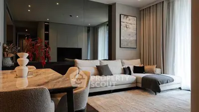 Luxurious modern living room with elegant decor and cozy seating area.