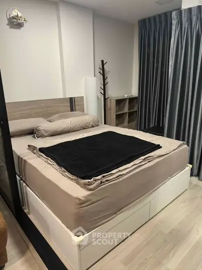 Modern bedroom with stylish decor and ample storage space