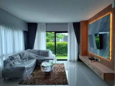 Modern living room with large window and stylish decor