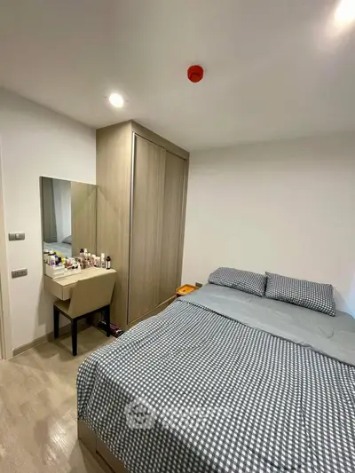 Cozy bedroom with modern wardrobe and stylish decor