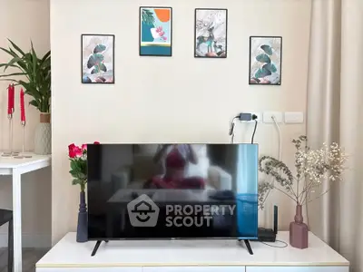 Stylish living room with modern TV setup and elegant decor