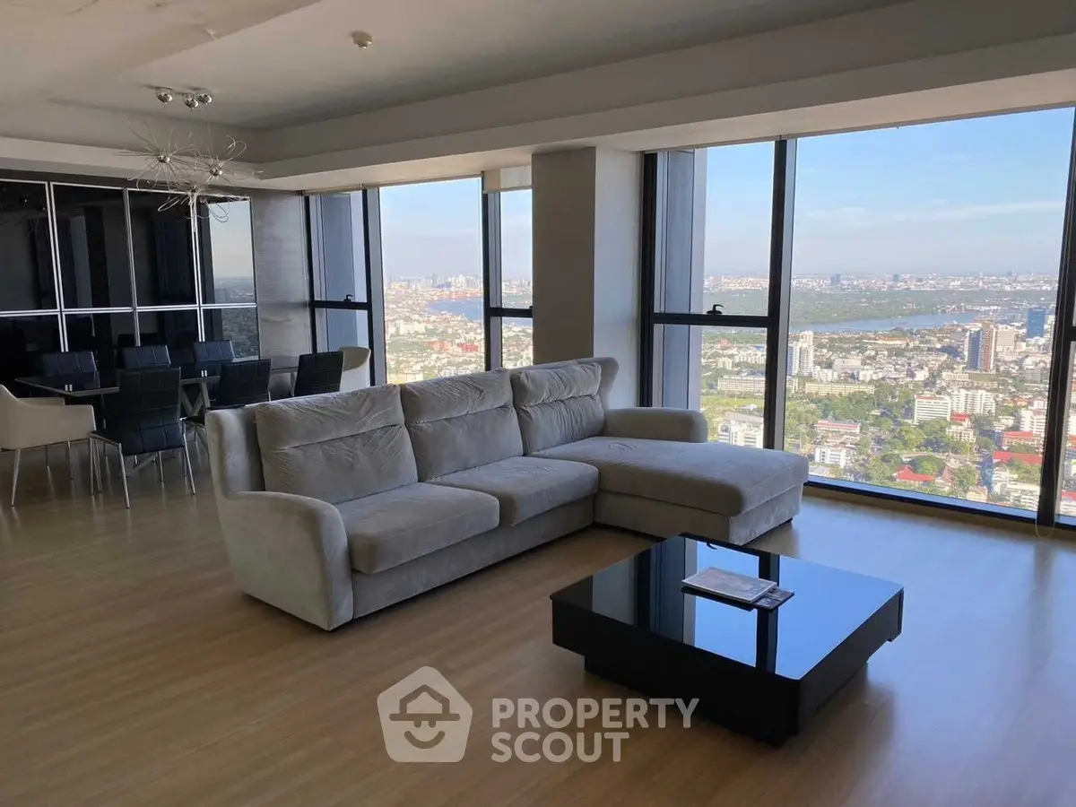 Luxurious living room with panoramic city view and modern furnishings