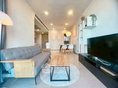 Modern living room with stylish furniture and open layout, perfect for relaxation and entertainment.
