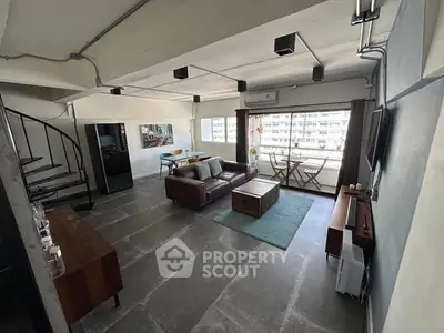 Spacious modern living room with balcony in urban apartment