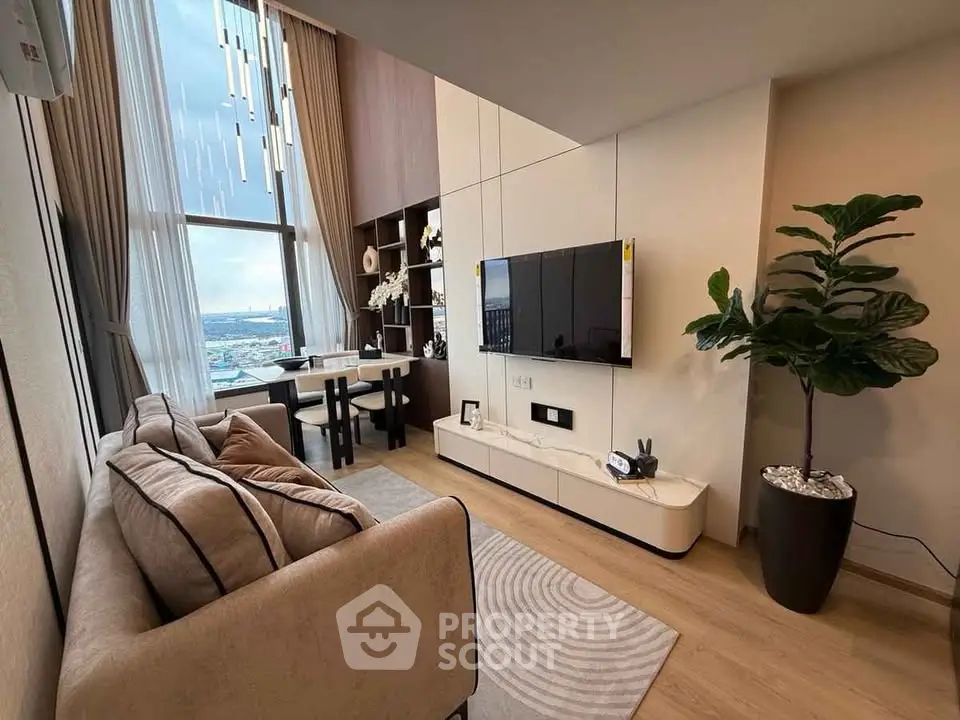 Luxurious modern living room with high ceilings and stunning city view