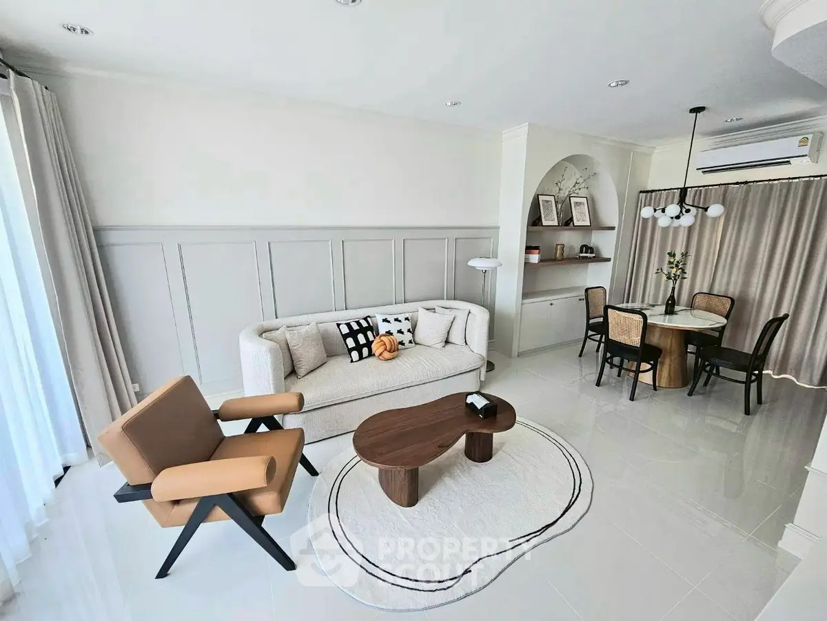 Modern living room with stylish furniture and elegant decor