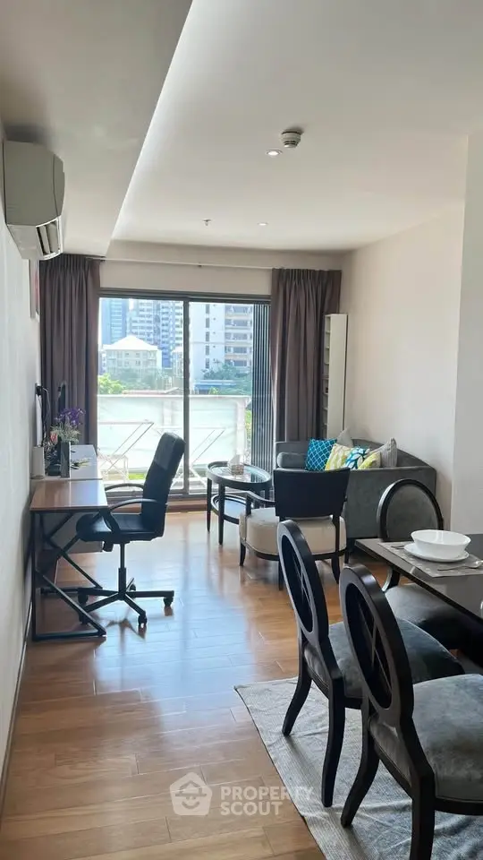 Modern living room with balcony view in urban apartment