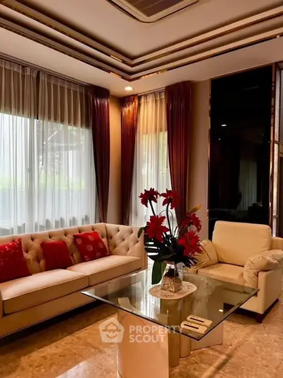 Luxurious living room with elegant decor and plush seating