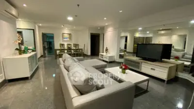 Spacious modern living room with sleek furniture and elegant decor