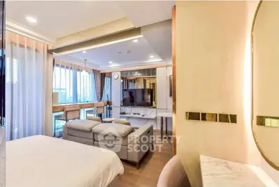 Luxurious modern living room with elegant decor and large windows offering stunning views.