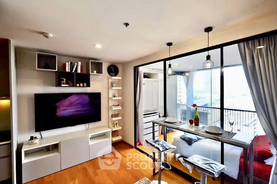 Modern open-plan living room with stylish kitchen and balcony view