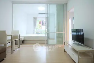 Modern studio apartment with open layout and natural light