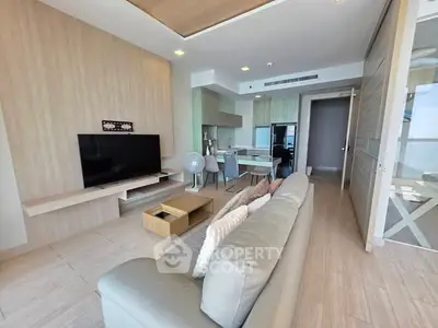 Modern living room with open kitchen and stylish decor