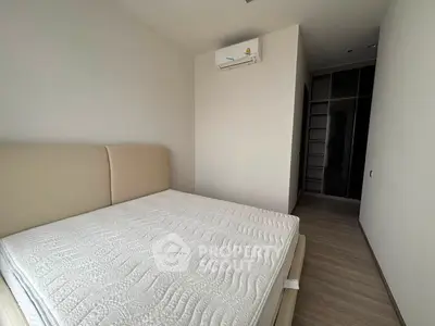 Modern bedroom with minimalist design and built-in wardrobe