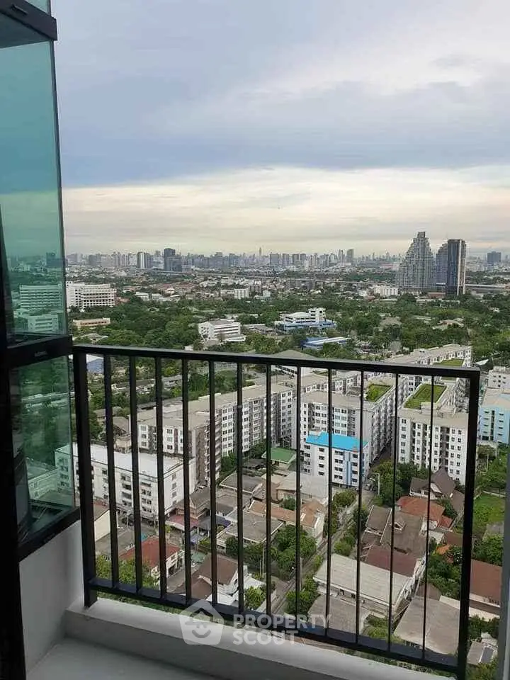 Stunning cityscape view from a high-rise balcony, perfect for urban living enthusiasts.