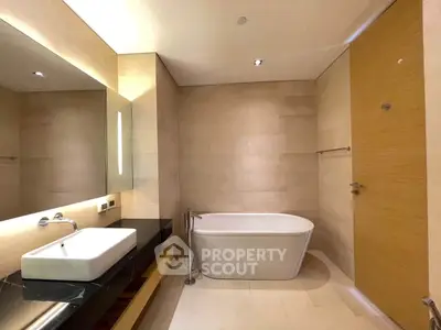 Luxurious modern bathroom with elegant bathtub and sleek vanity