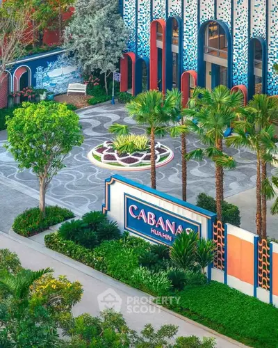 Vibrant exterior of Cabana Hua Hin with lush landscaping and colorful architecture.
