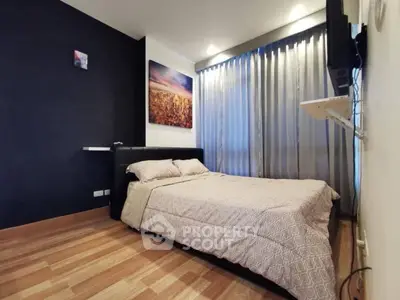 Cozy modern bedroom with stylish decor and natural light