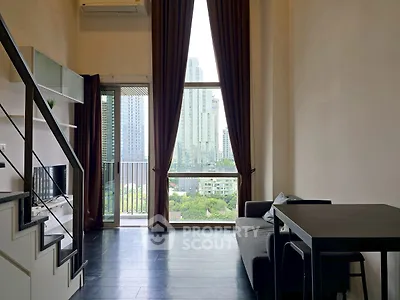 Modern living room with high ceiling and city view balcony in luxury apartment