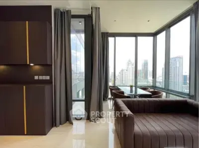 Luxurious corner unit living room with panoramic city views and modern furnishings.