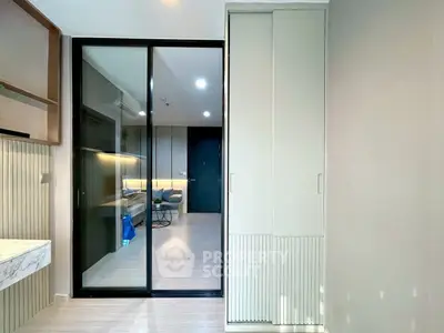 Modern interior with sliding glass doors and sleek design elements