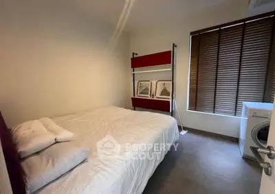 Cozy bedroom with modern decor and natural light