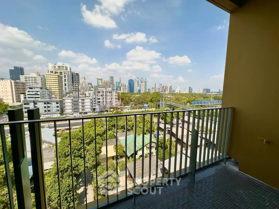 Stunning cityscape view from a modern balcony, perfect for urban living.