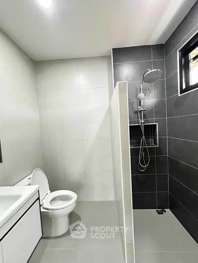 Modern bathroom with sleek design and spacious shower area