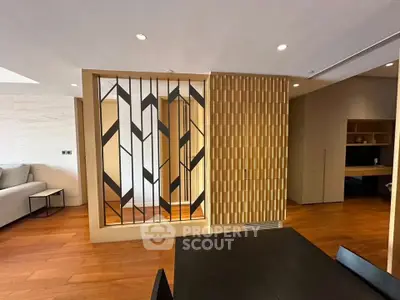 Modern living room with stylish wooden partition and elegant decor