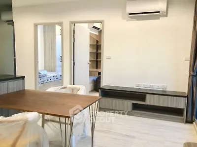 Modern apartment interior with air conditioning and stylish furniture