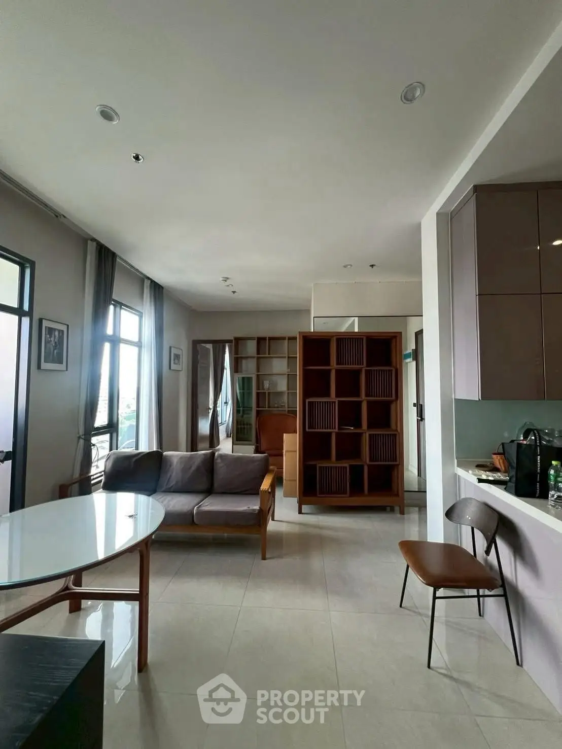 Spacious modern living room with elegant furniture and natural light