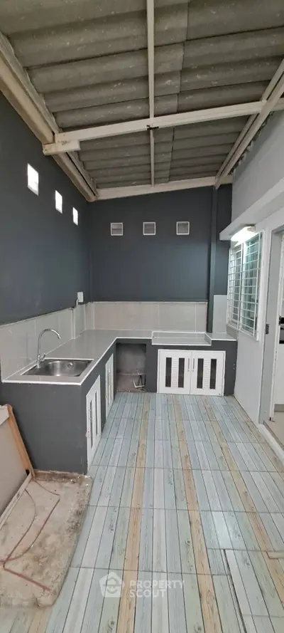 Spacious kitchen with modern design and ample natural light