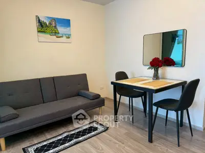 Cozy living room with modern furniture and elegant decor, perfect for relaxation and entertaining.
